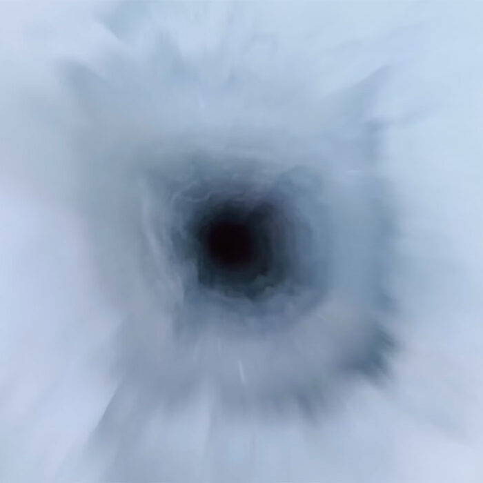 Camera dropping down a borehole in the Doomsday Glacier