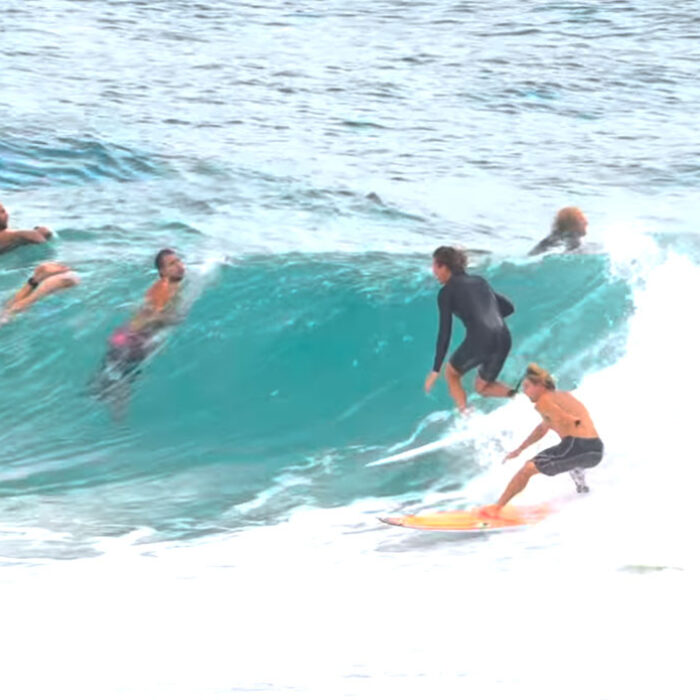 Snapper Rocks surfers navigating a crowded lineup