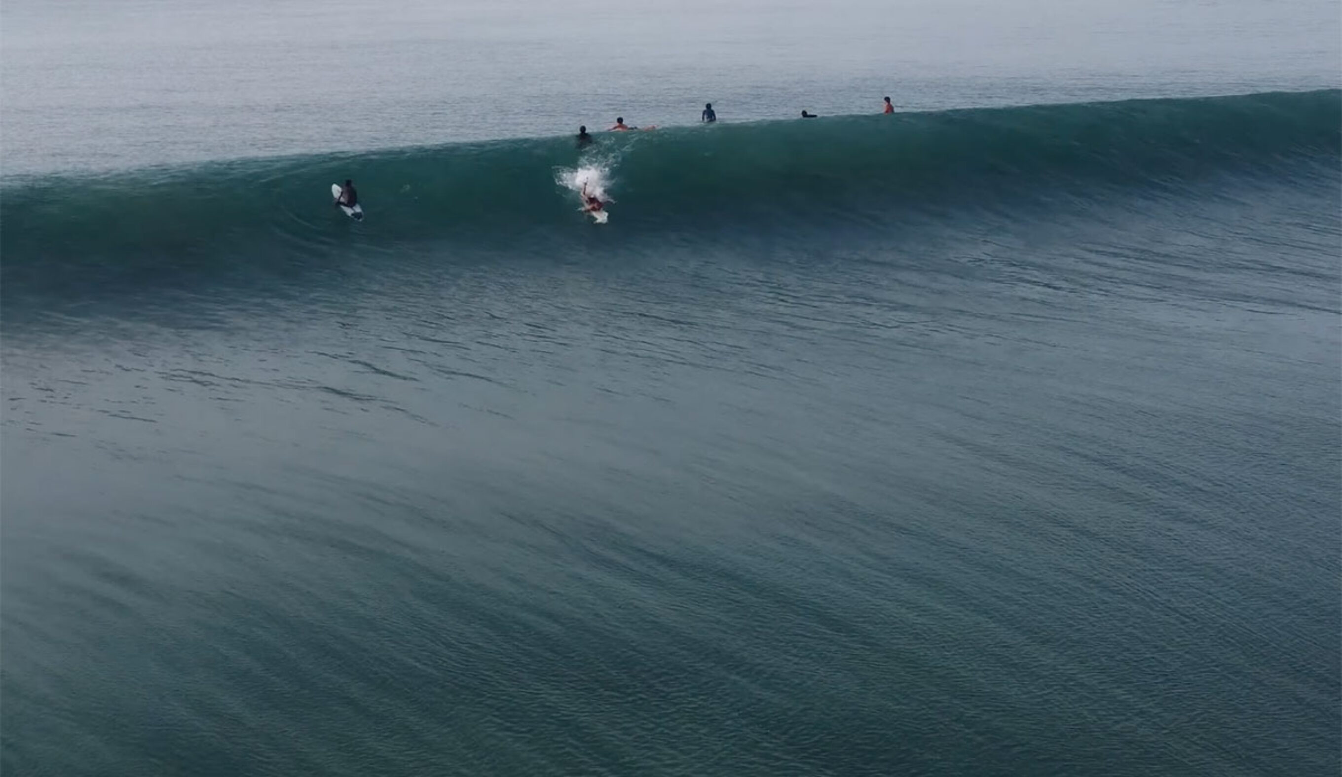 Nias surfing with only a few people in the lineup at Lagundri Bay