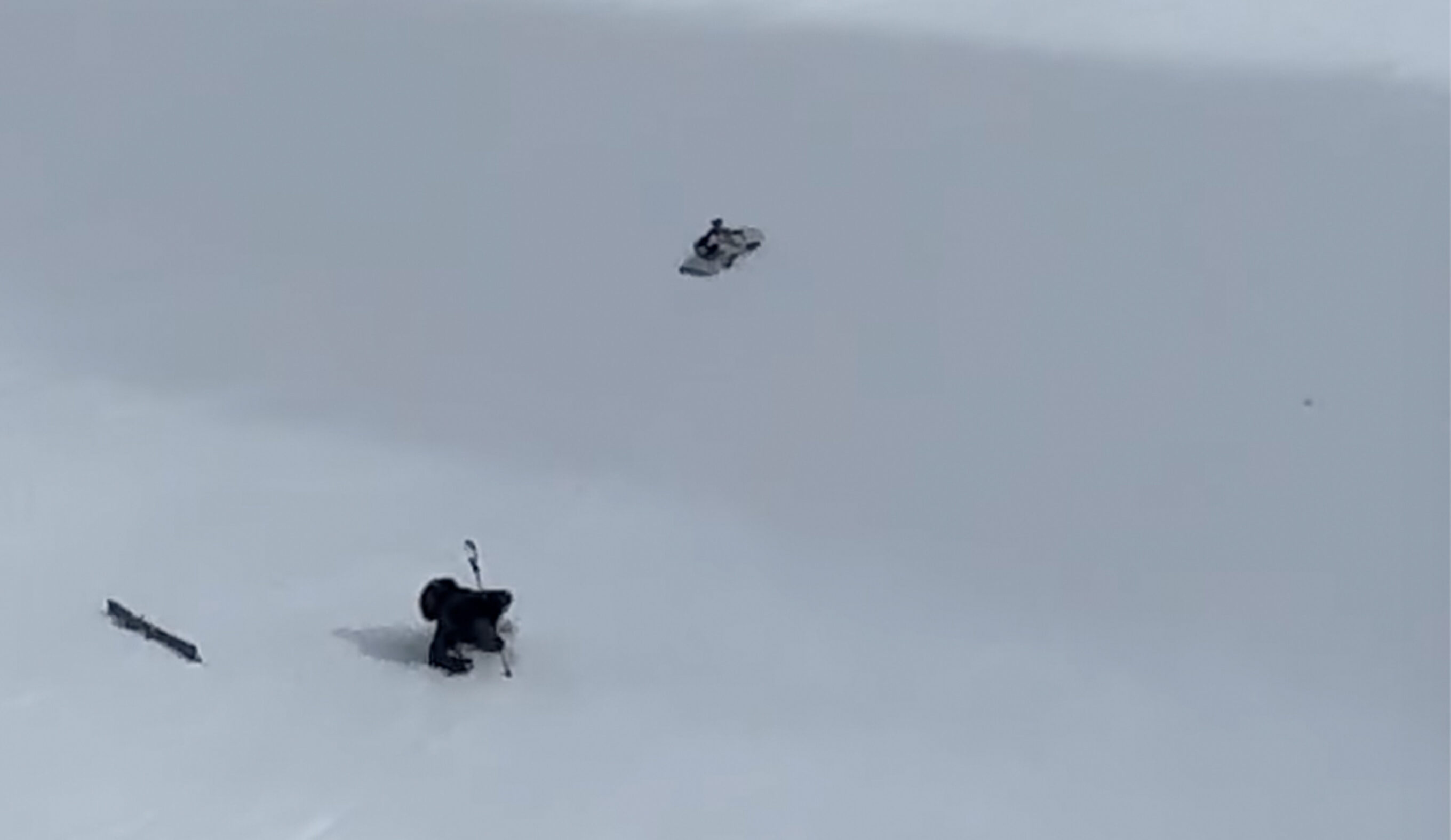 Snowboard sliding down hill in the Dolomites
