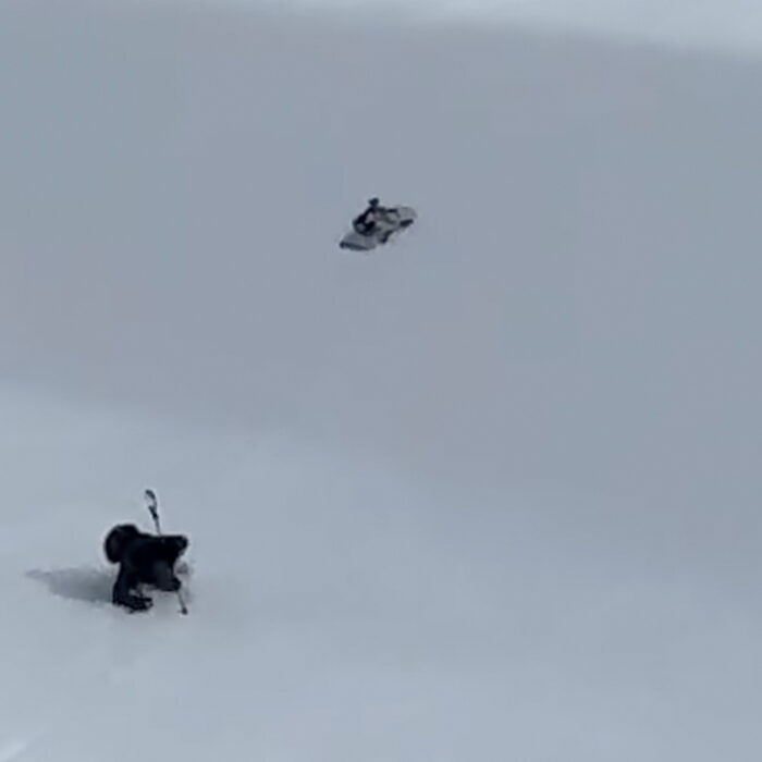 Snowboard sliding down hill in the Dolomites
