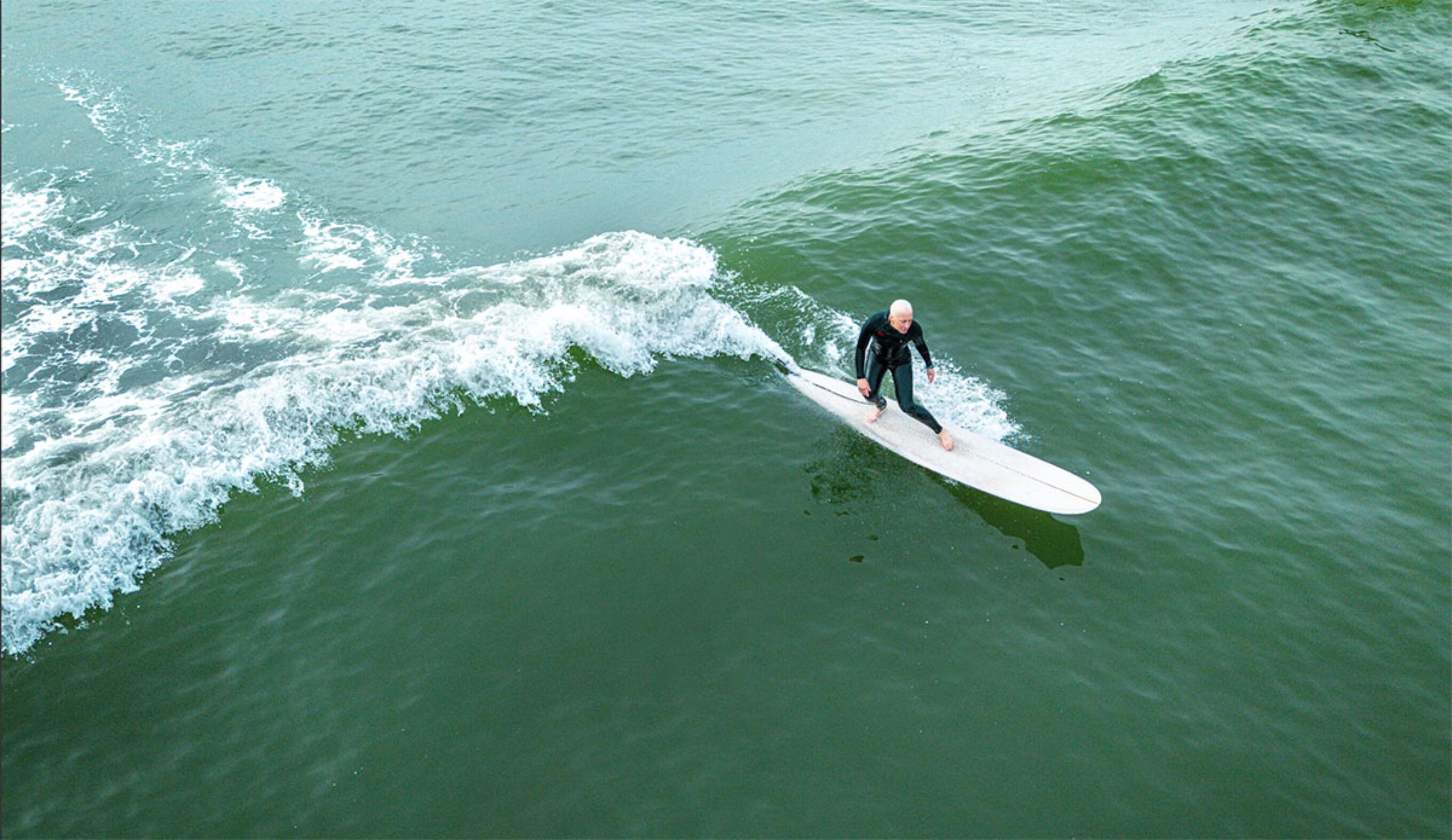 Danielle Cass surfing
