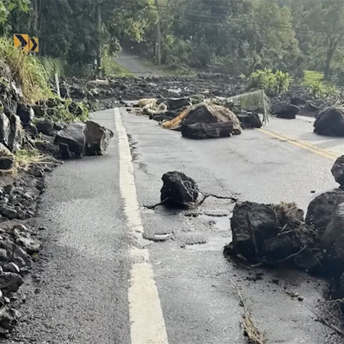 Hawaii road blocked by rocks after flooding