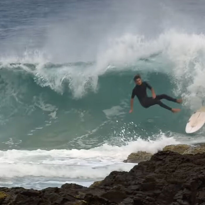 Gold Coast surfer wiping out at Snapper Rocks