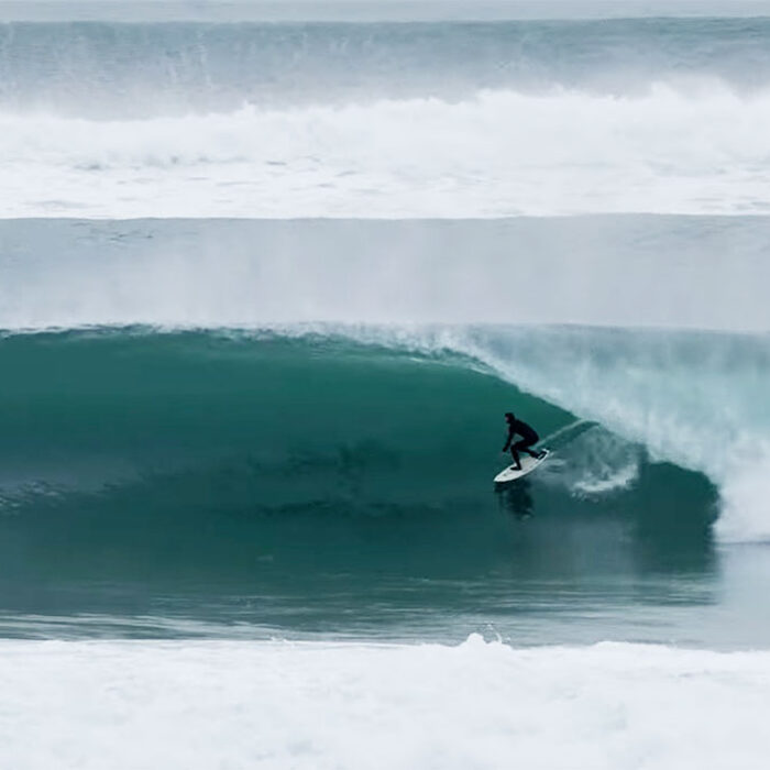 Surfer in a barrel at La Graviere in Hossegor, France