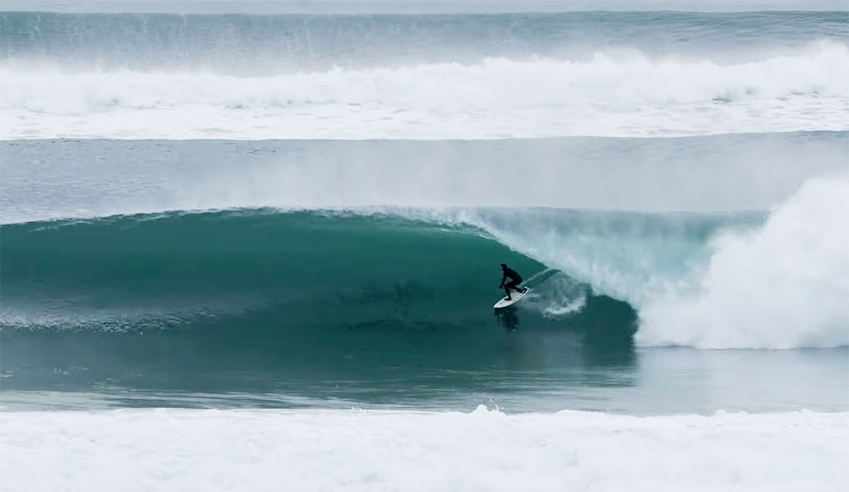 Surfer in a barrel at La Graviere in Hossegor, France
