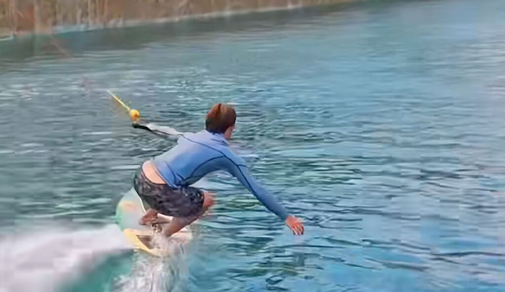 Lucas Fink testing what is possible in a wave pool when you tow at the waves.