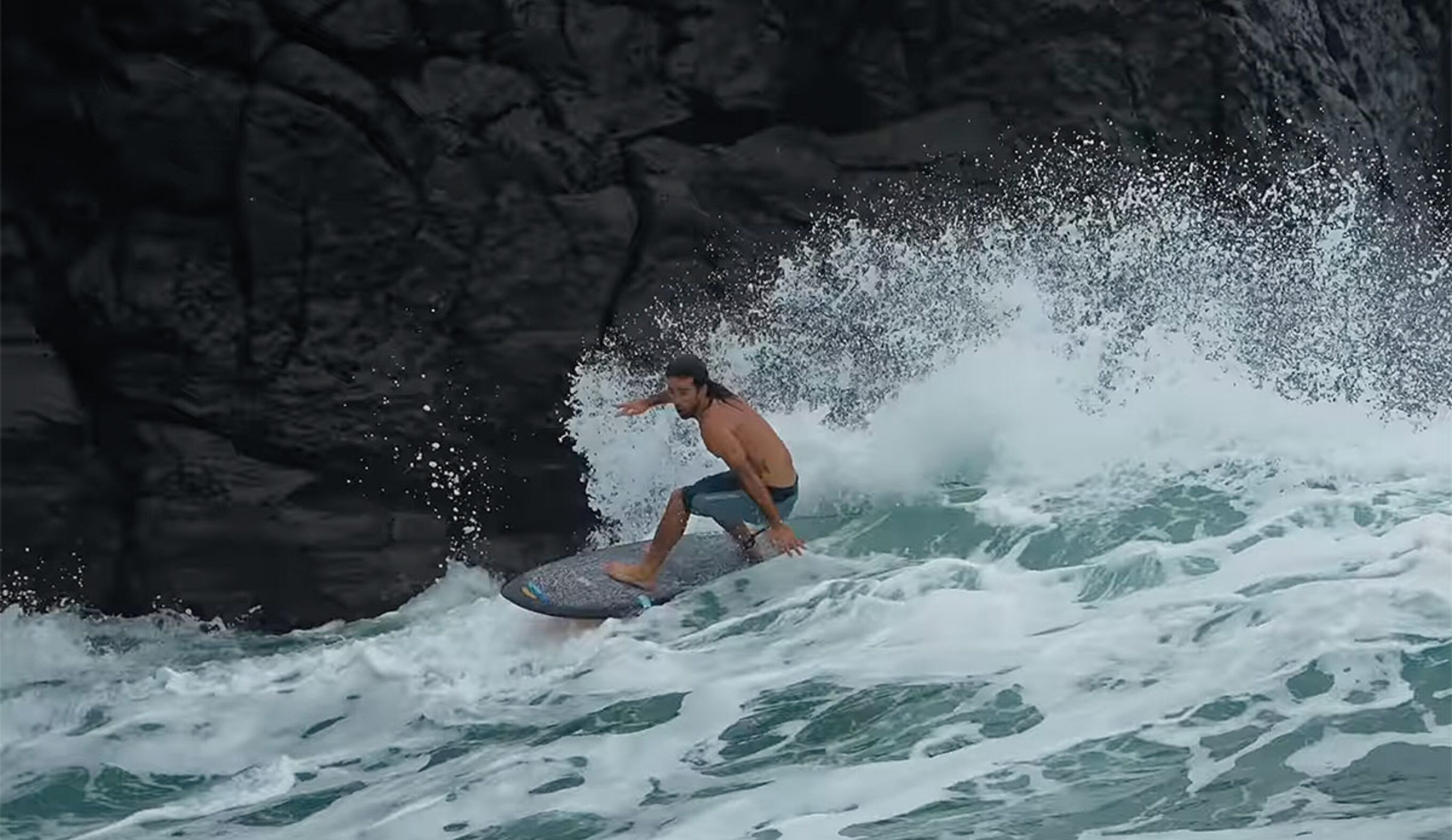 Mason Ho surfing at Mermaid Rock