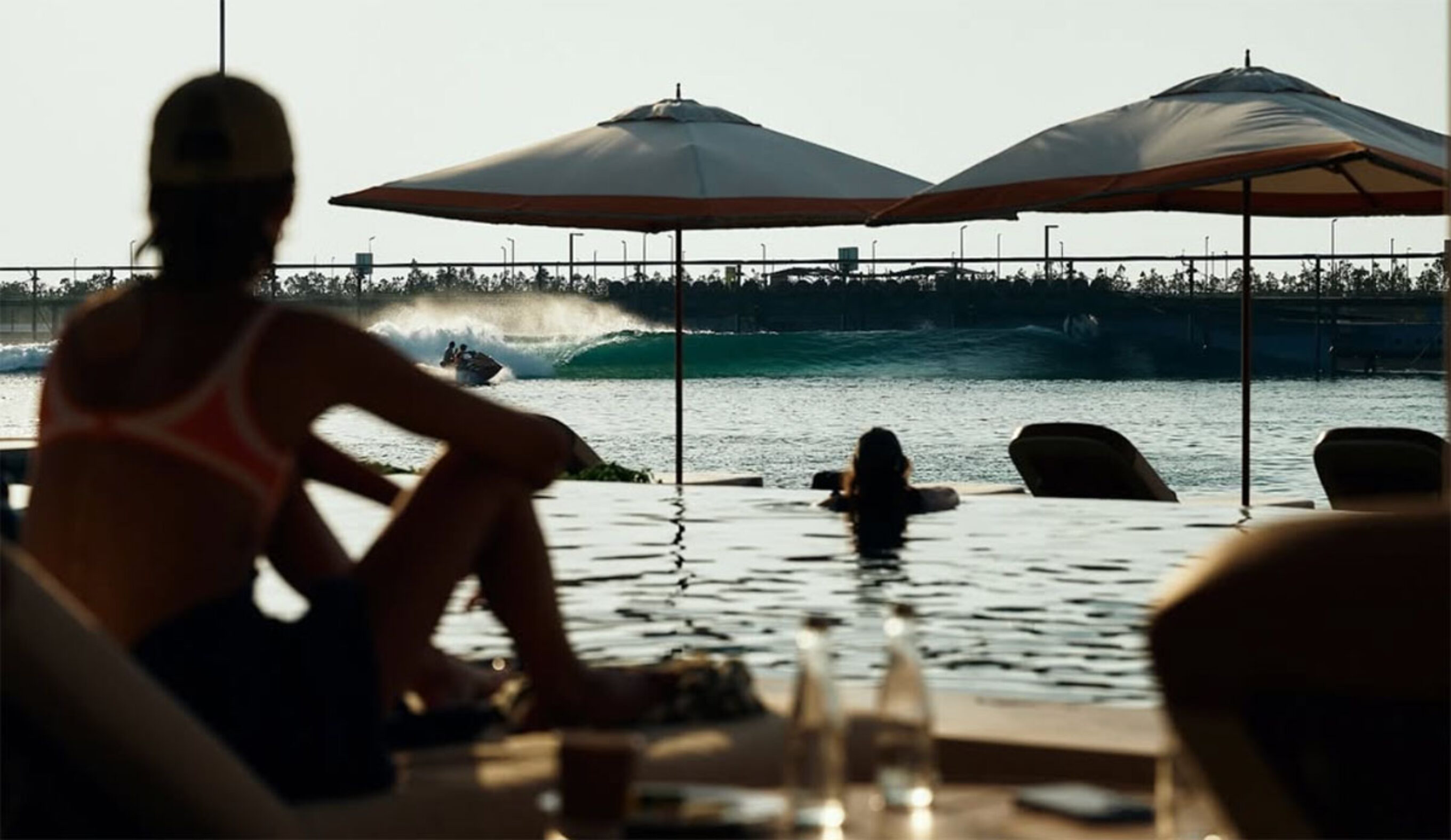 Person watching a wave at Surf Abu Dhabi