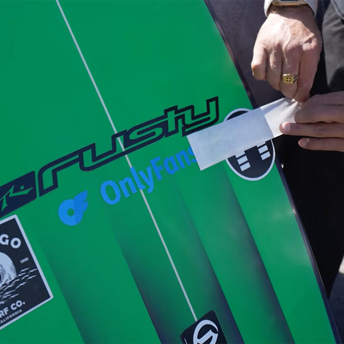 Zeke reveals a new sticker on his quiver. Photo: Jacob Szekely // YouTube