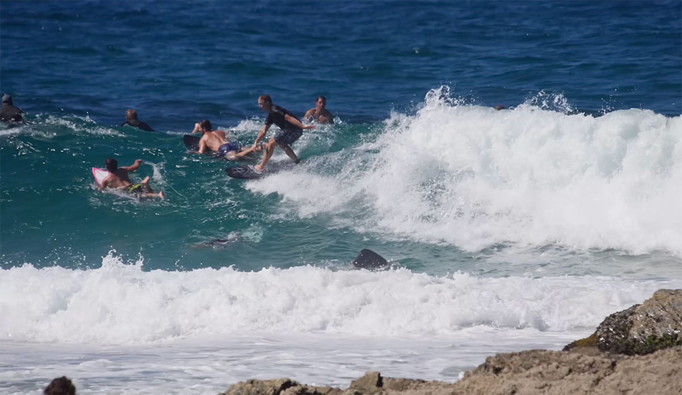 Jamie O'Brien surfing at Snapper Rocks