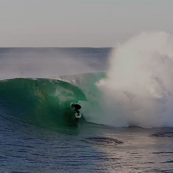 Kipp Caddy surfing Shark Island
