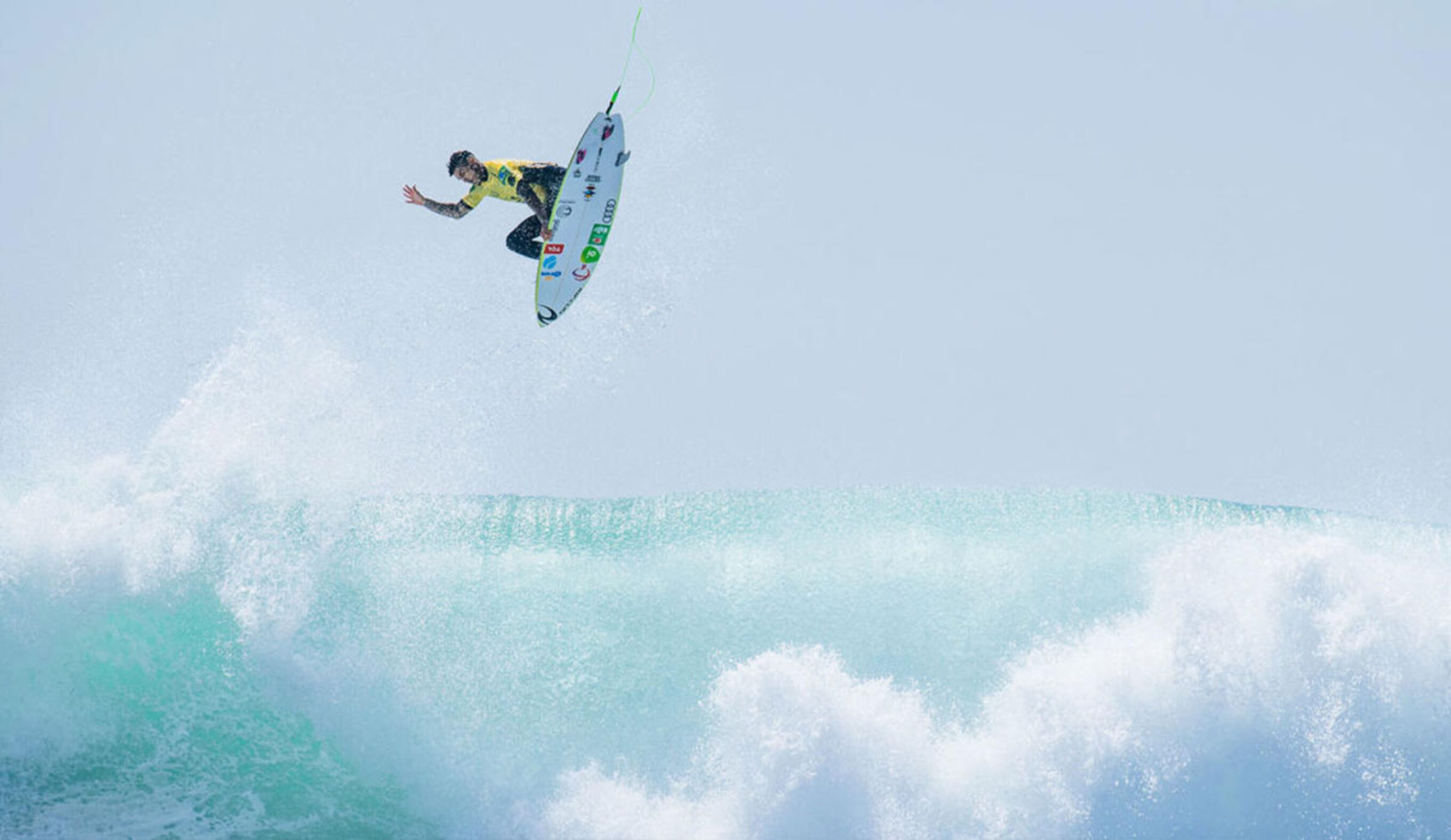 Gabriel Medina doing an aerial maneuver